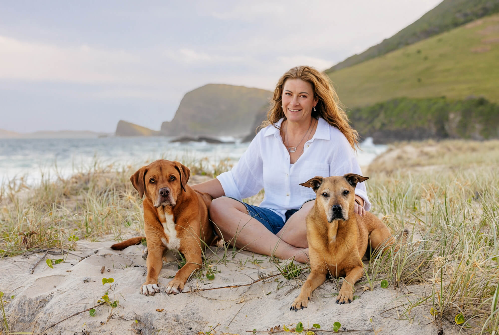 Woman with her dogs on Blueys Beach